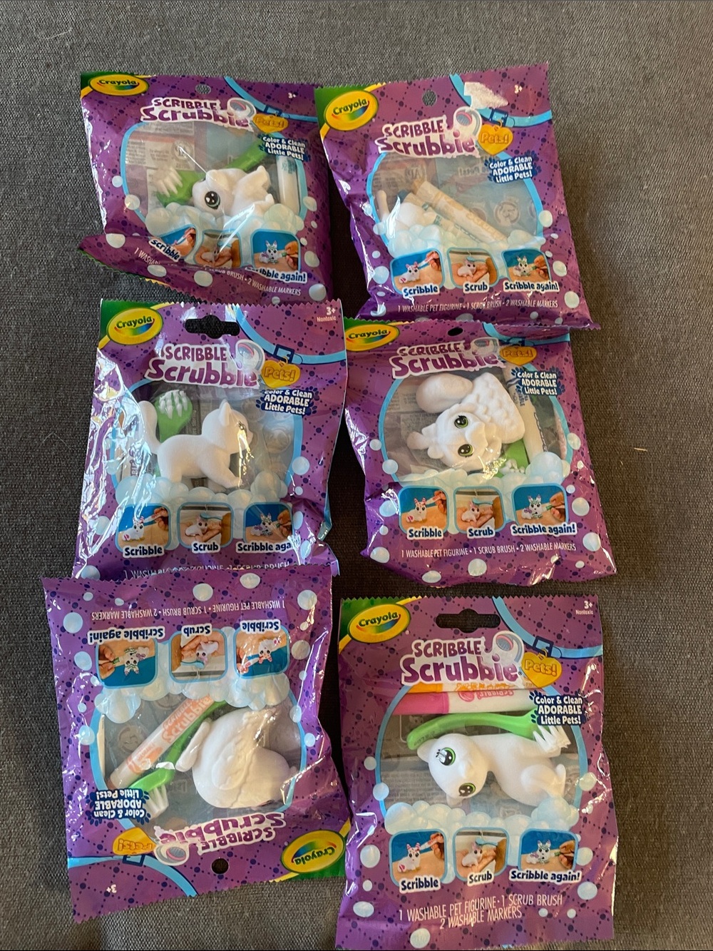 Crayola Scribble Scrubbie Pets - White Figures with Purple Packaging